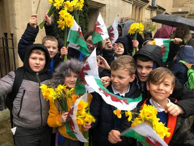 Pupils gather to greet Prince Charles a year ago in Oxford 