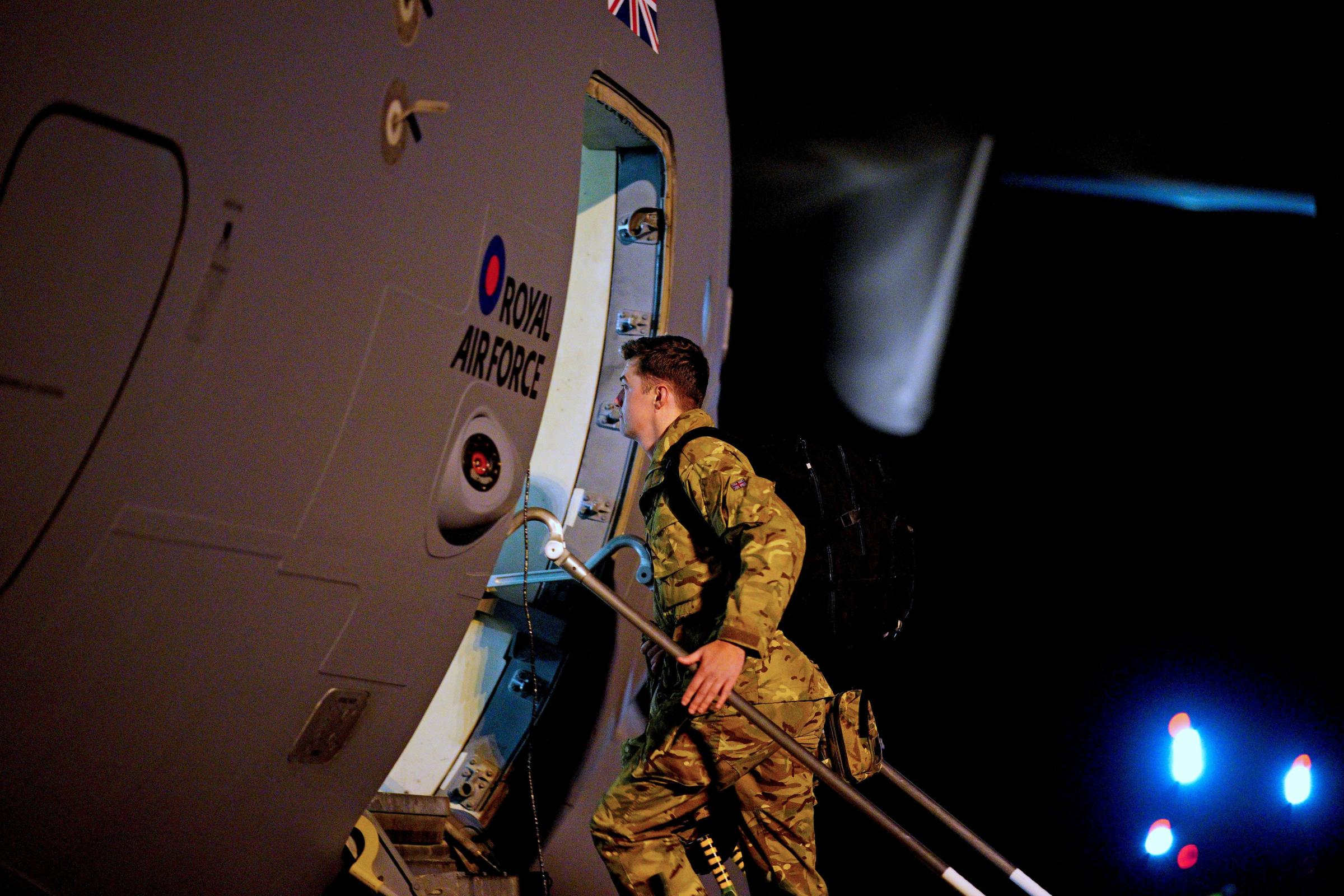 Military personnel board a C17 aircraft at RAF Brize Norton in Oxfordshire Picture: Ben Birchall/PA Wire 